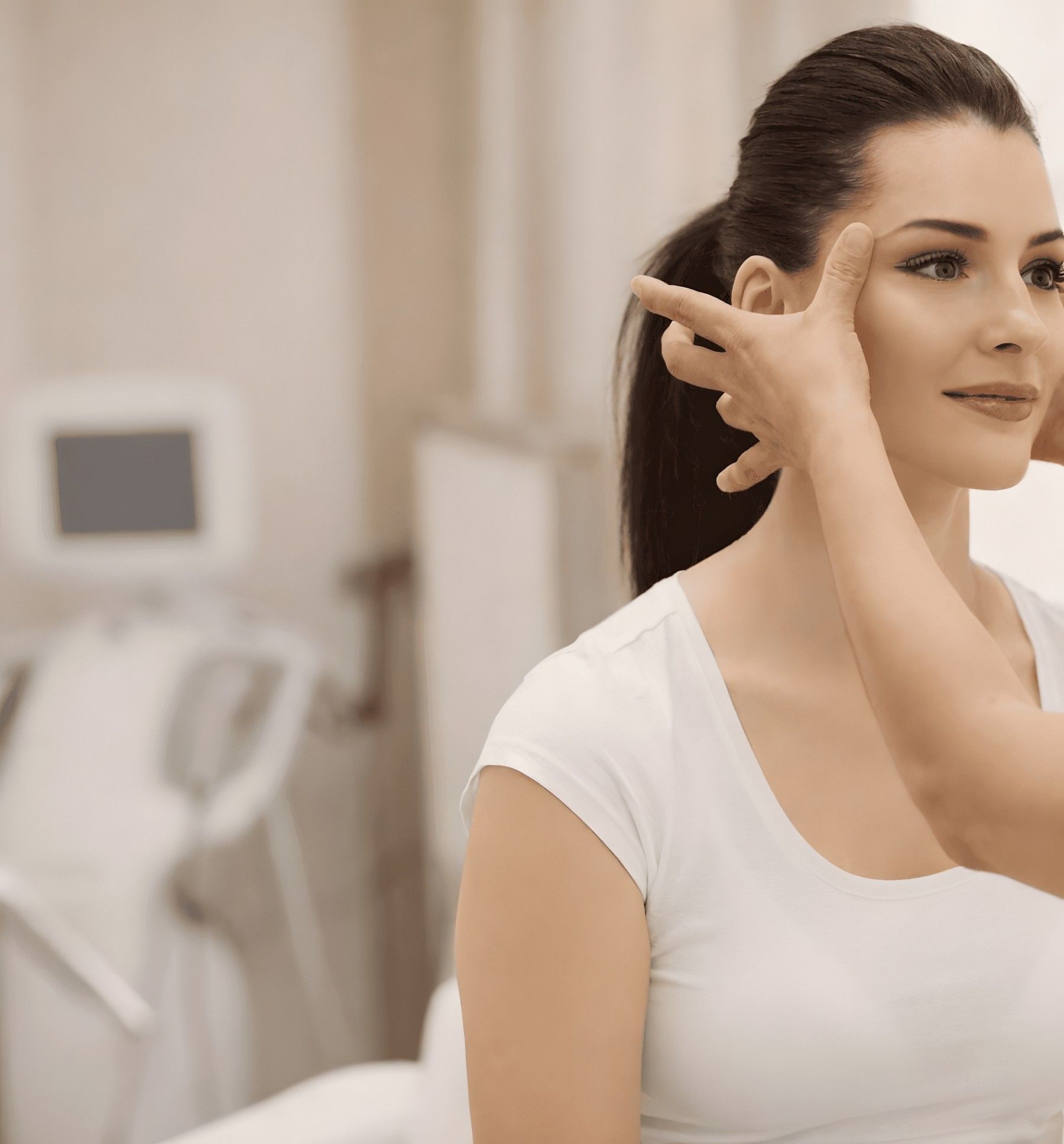 Clinician assessing facial contours to tailor a plan